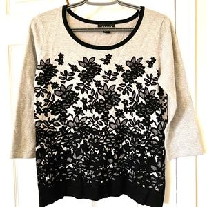 Light grey blouse with black floral design